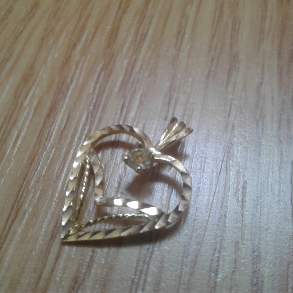 Gold heart charm
